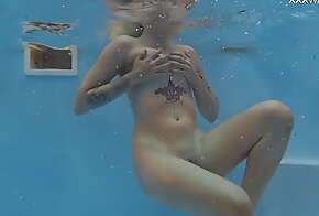 Mimi Cica gets horny underwater and naked