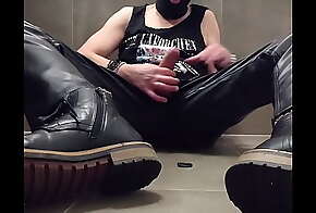 Masturbation in leather and mask
