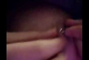 teen piercing her own nipple