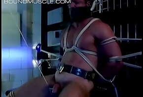 Derek is bound and has his balls pulled tight