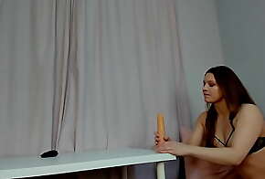 Dildo suck sitting on a table