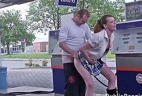 Kinky babe is kissing a guy at the Gas Station