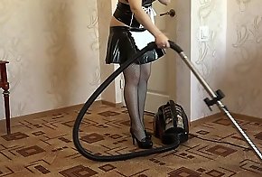 A maid vacuum cleaner and masturbates her ass