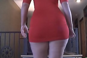 Woman shakes her big ass in a red dress